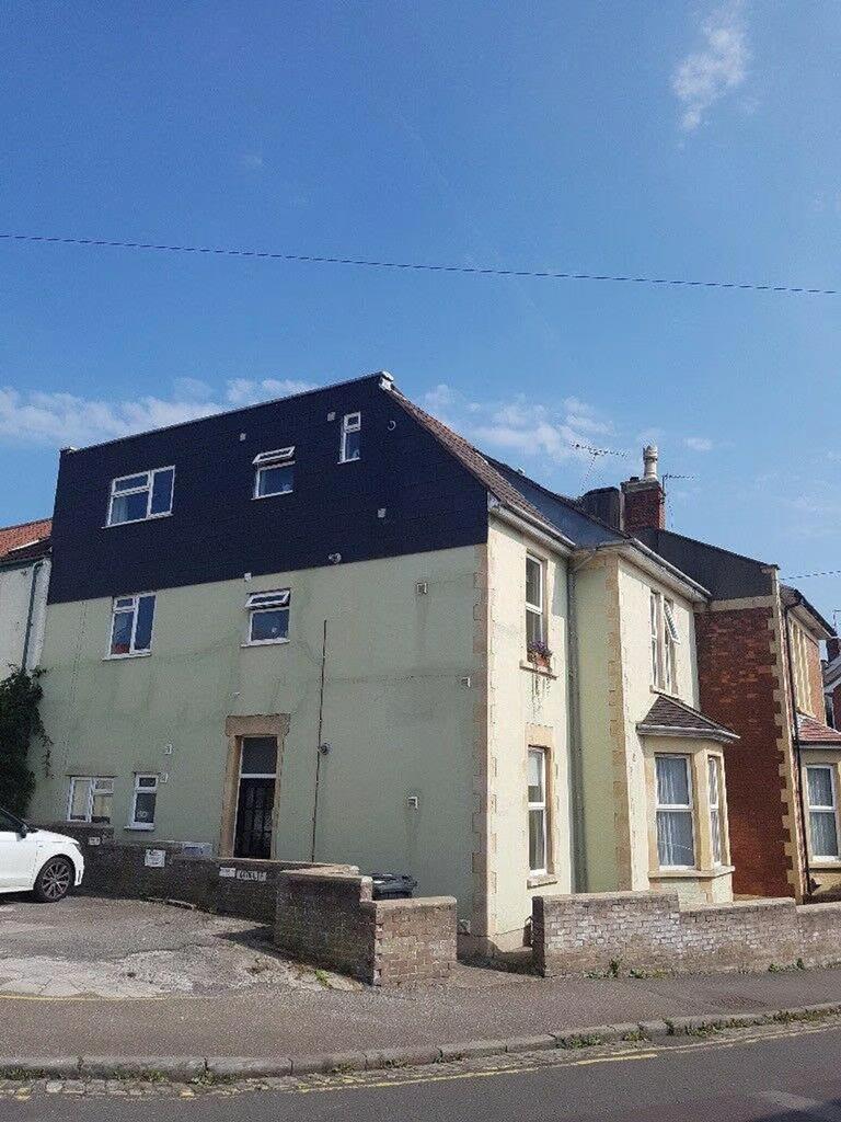 A well-maintained exterior of a property with b...