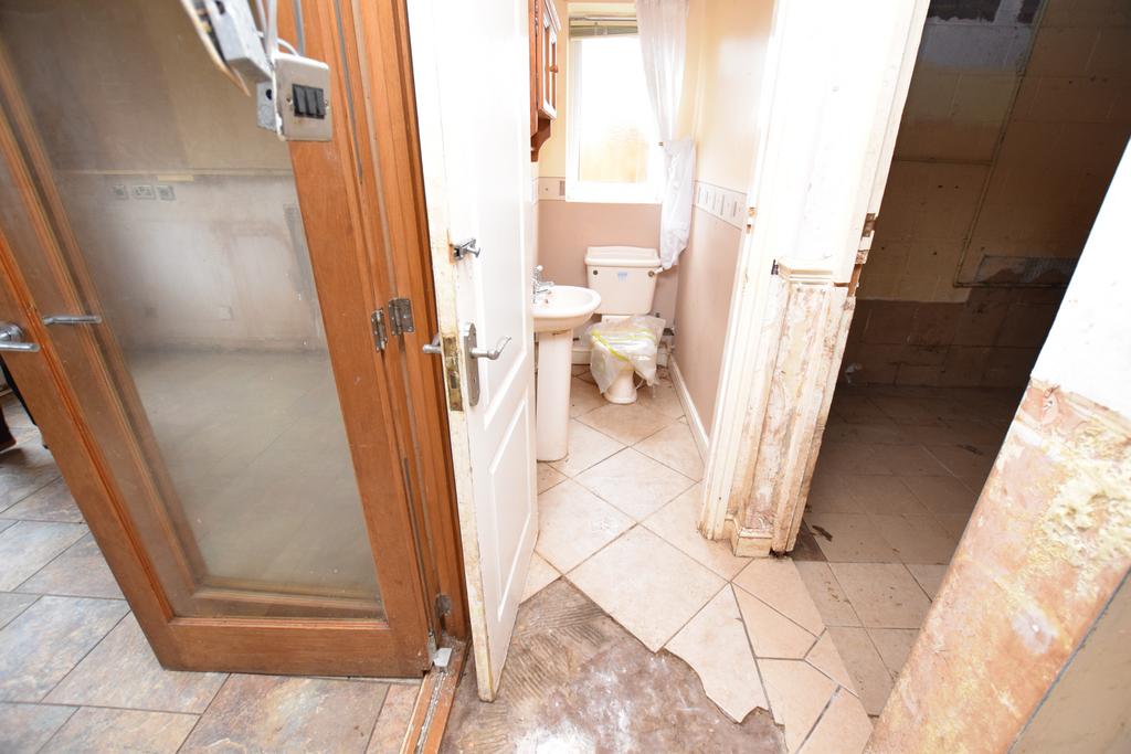 Hallway to cloakroom &amp; original kitchen
