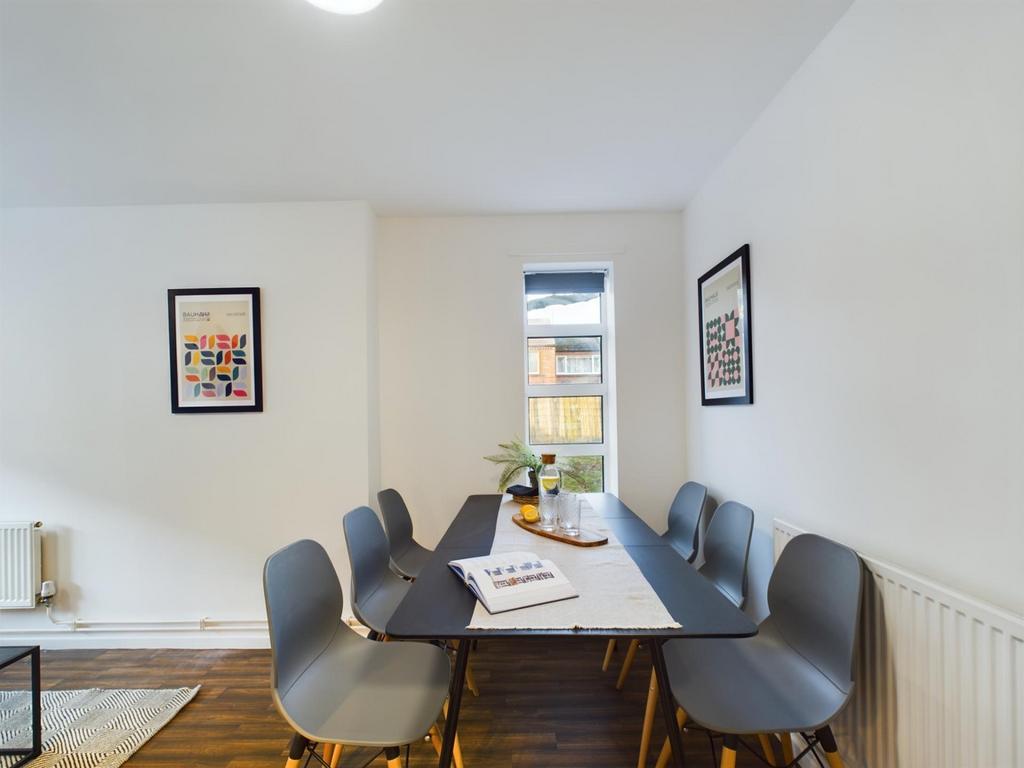 A bright and inviting communal workspace perfec...