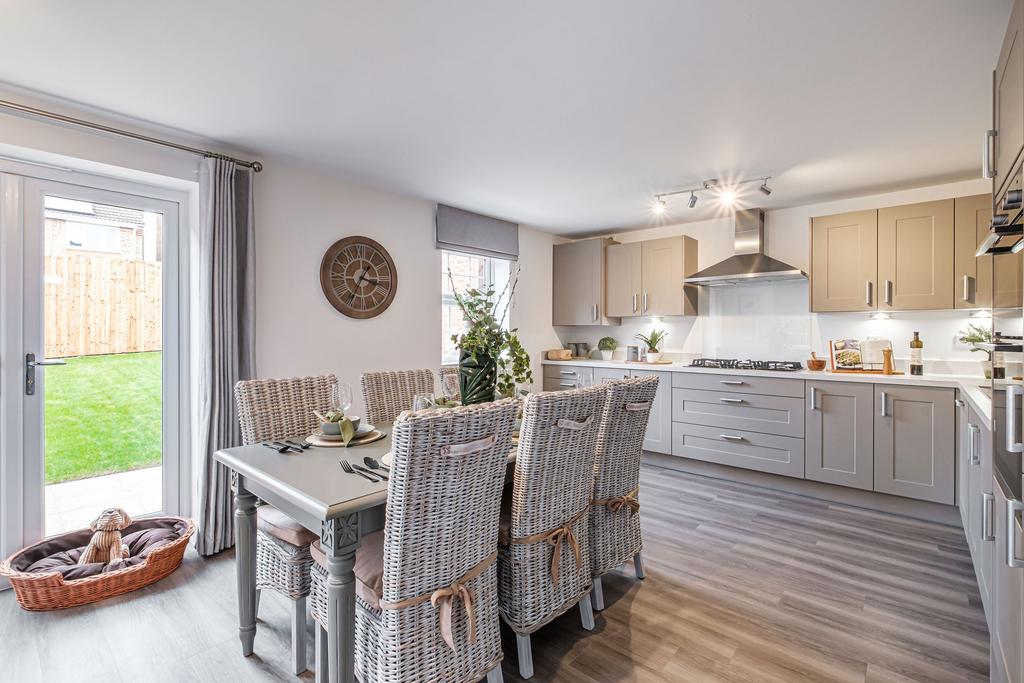 Hurst beige kitchen-diner with French doors to...