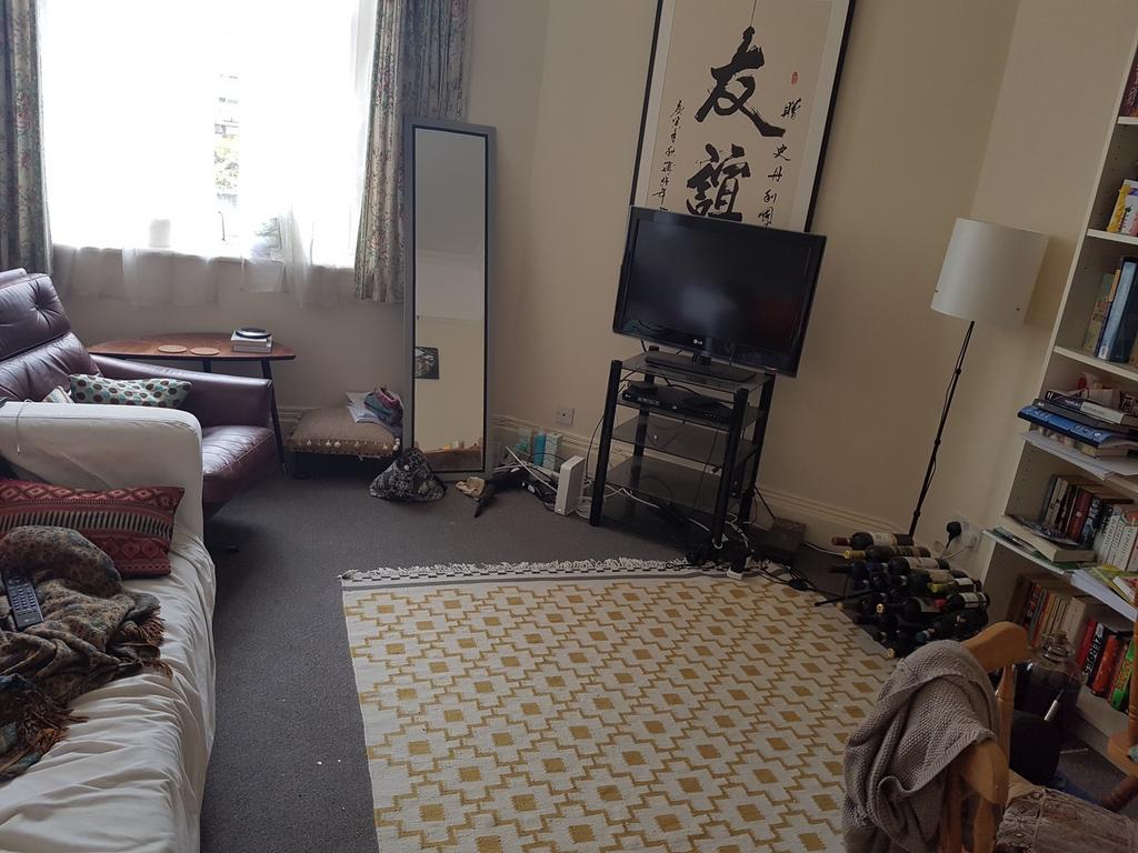 A spacious and inviting living room filled with...