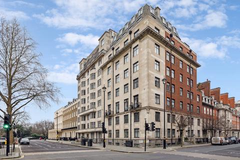 Flat 1, 86 Portland Place, London, W1B 1NU