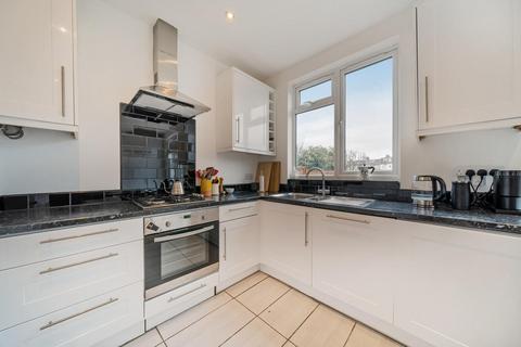 25 Abbott Avenue, London, SW20 8SG