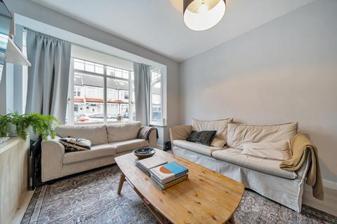 25 Abbott Avenue, London, SW20 8SG