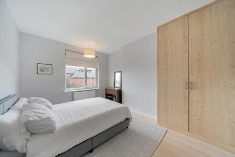 25 Abbott Avenue, London, SW20 8SG