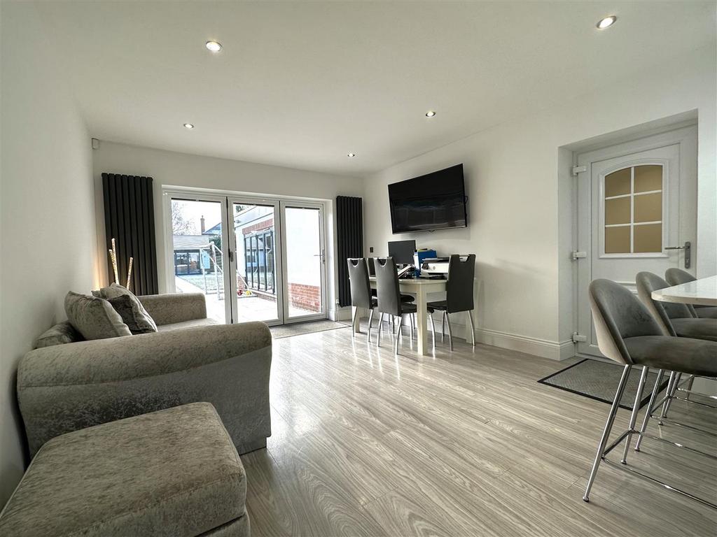 Living Area With BI-FOLD DOORS 161