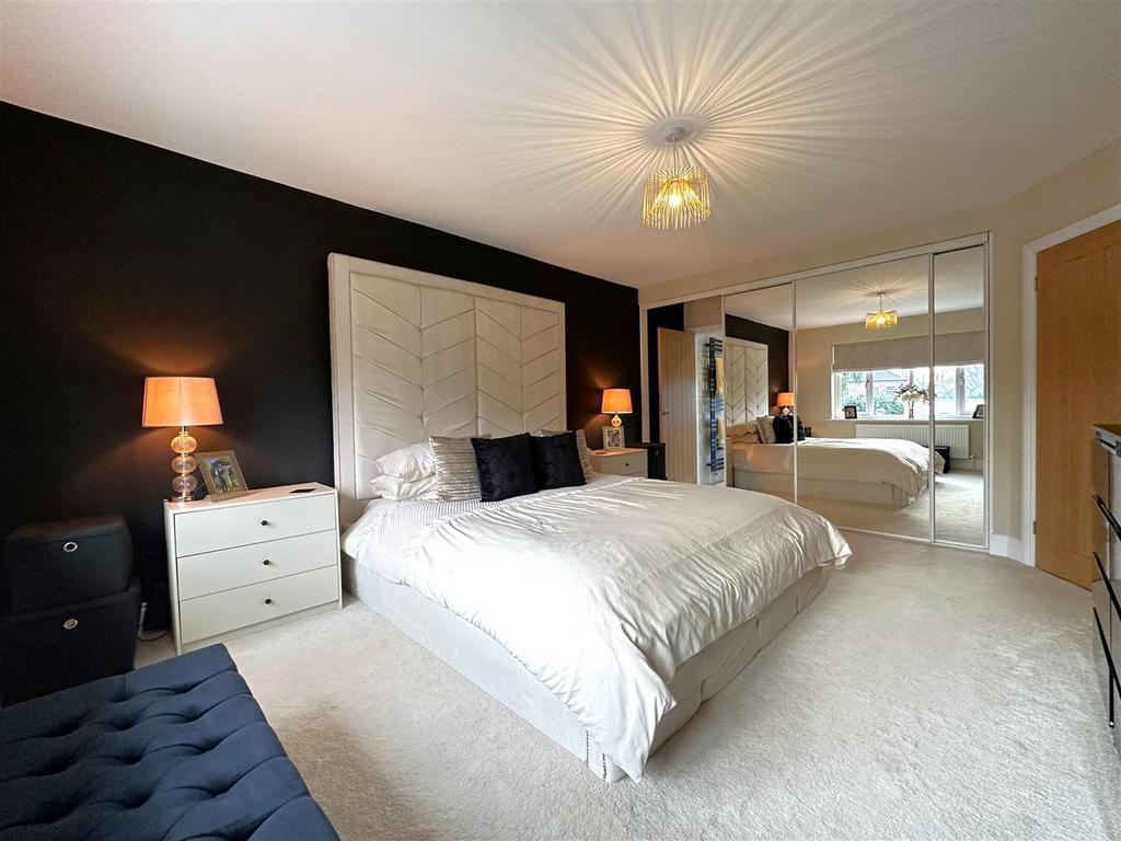 Principle Bedroom With Extensive Fitted Wardrobes
