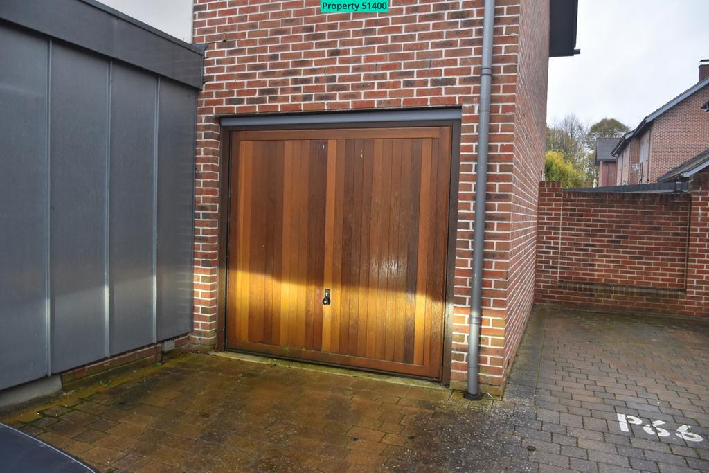 Covered Garage and Driveway