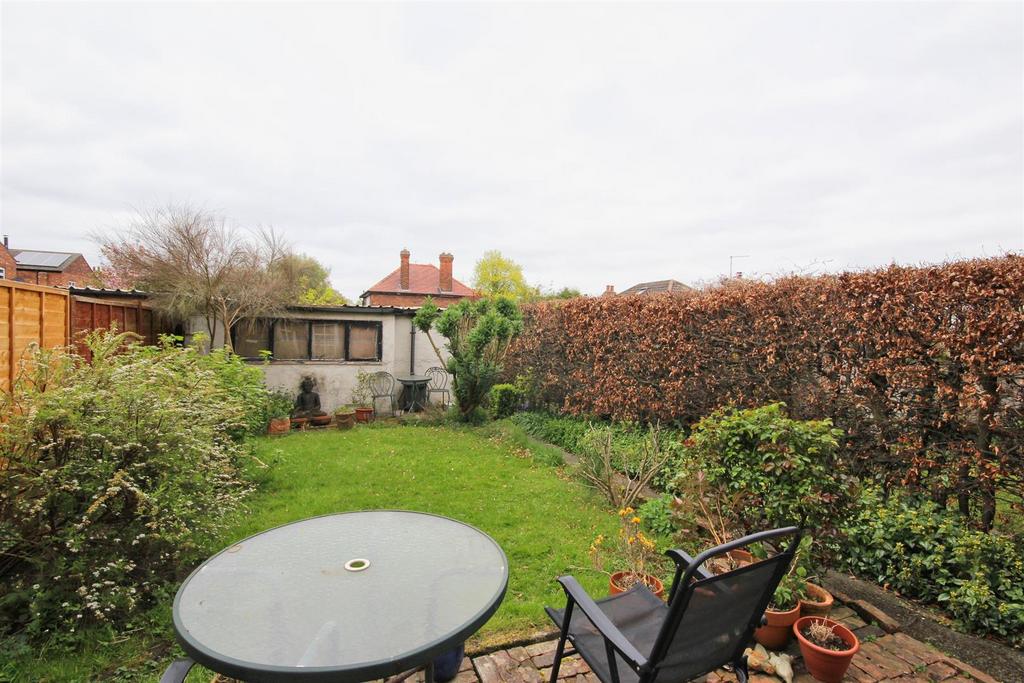 Garden with garage