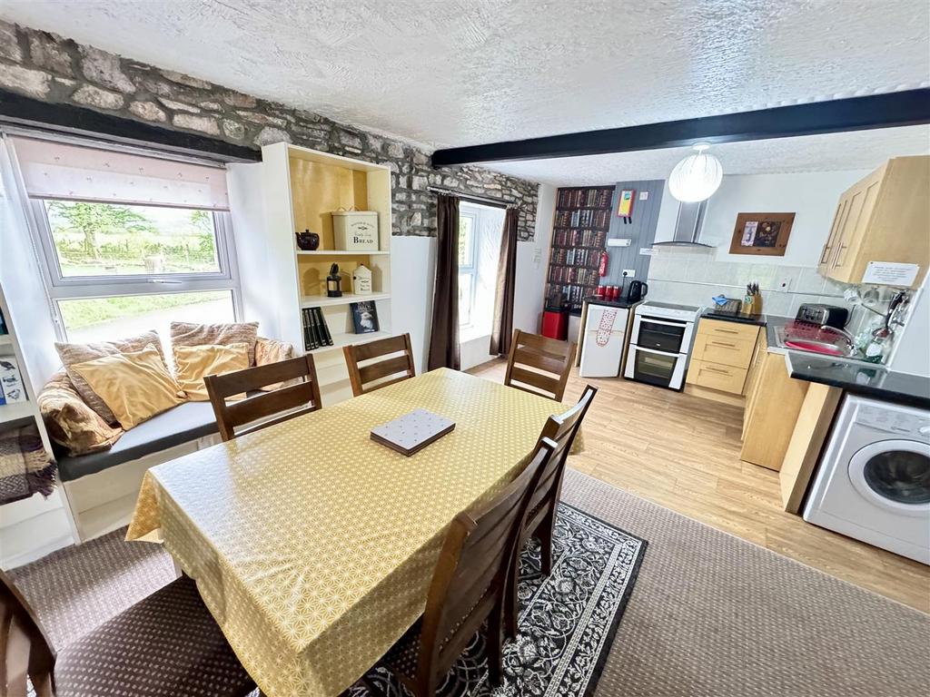 Front open plan kitchen/ living and dining area
