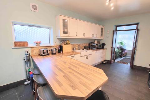2 Longroyde Road, Brighouse, HD6 3AS