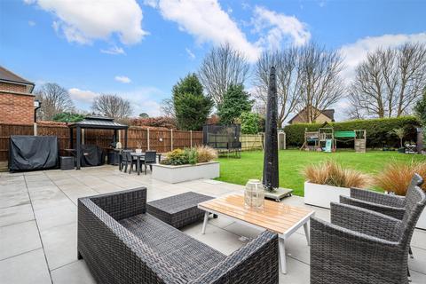12 Burgh Mount, Banstead, SM7 1ER