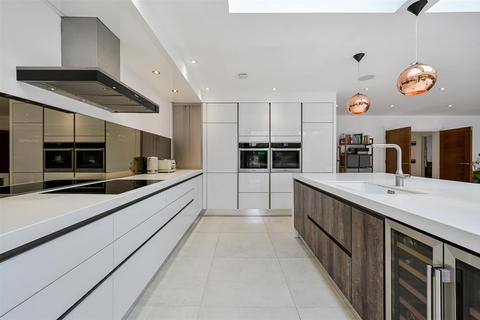 12 Burgh Mount, Banstead, SM7 1ER