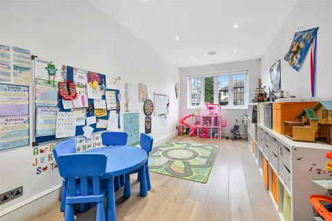 12 Burgh Mount, Banstead, SM7 1ER