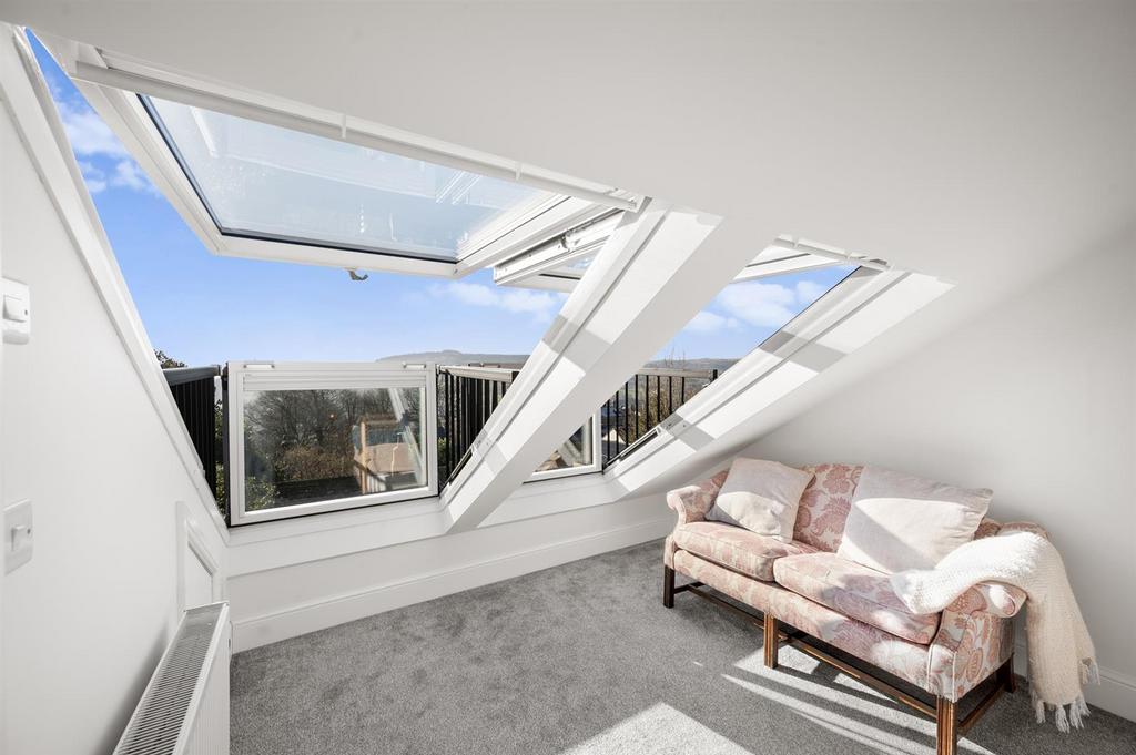 Bedroom Four - seating and balconies.jpg