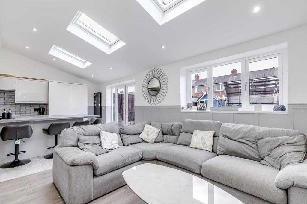 Open plan kitchen diner with seating area