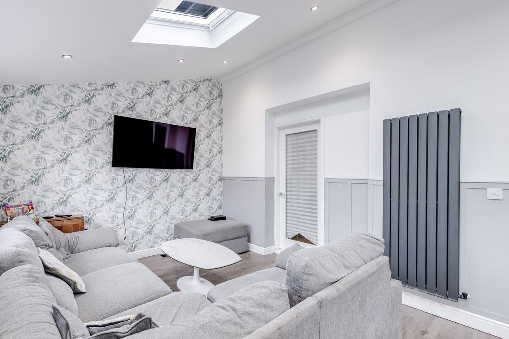 Open plan kitchen diner with seating area