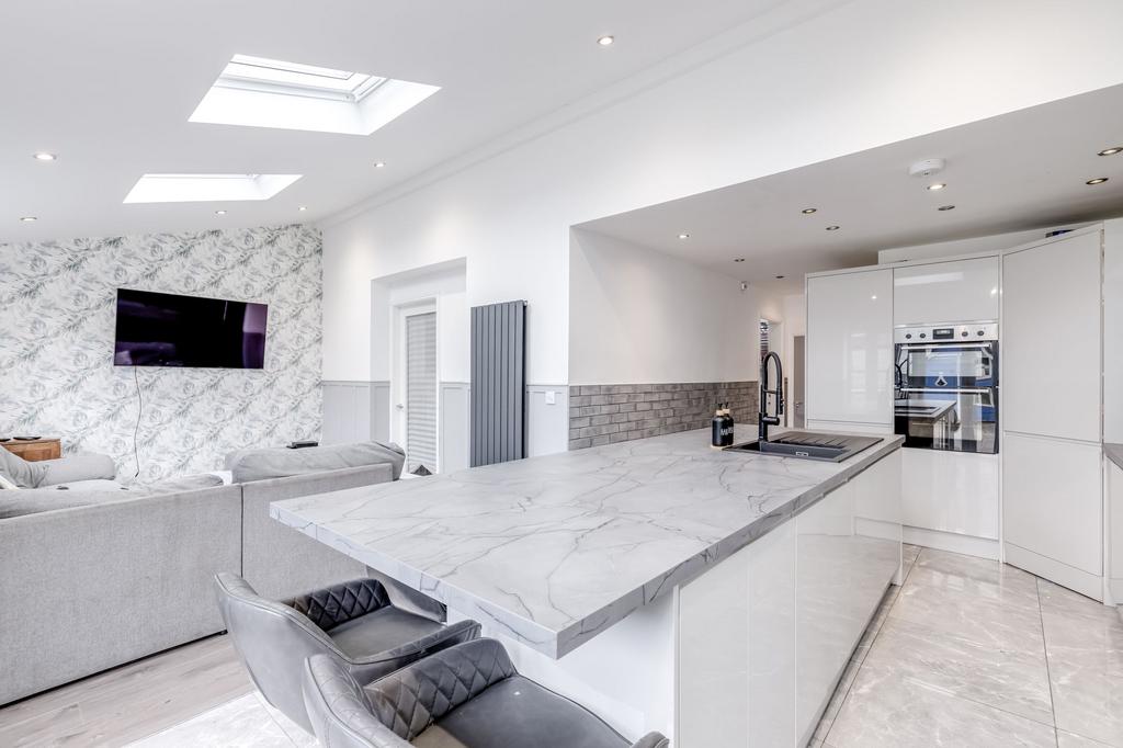 Open plan kitchen diner with seating area
