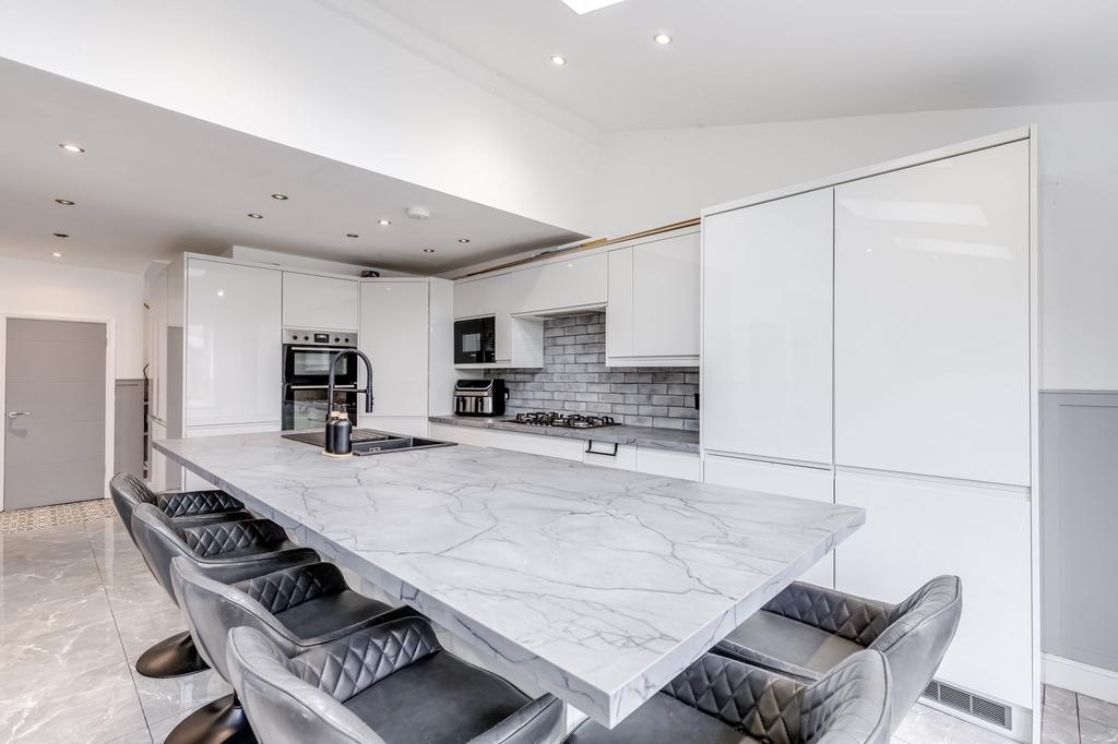 Open plan kitchen diner with seating area