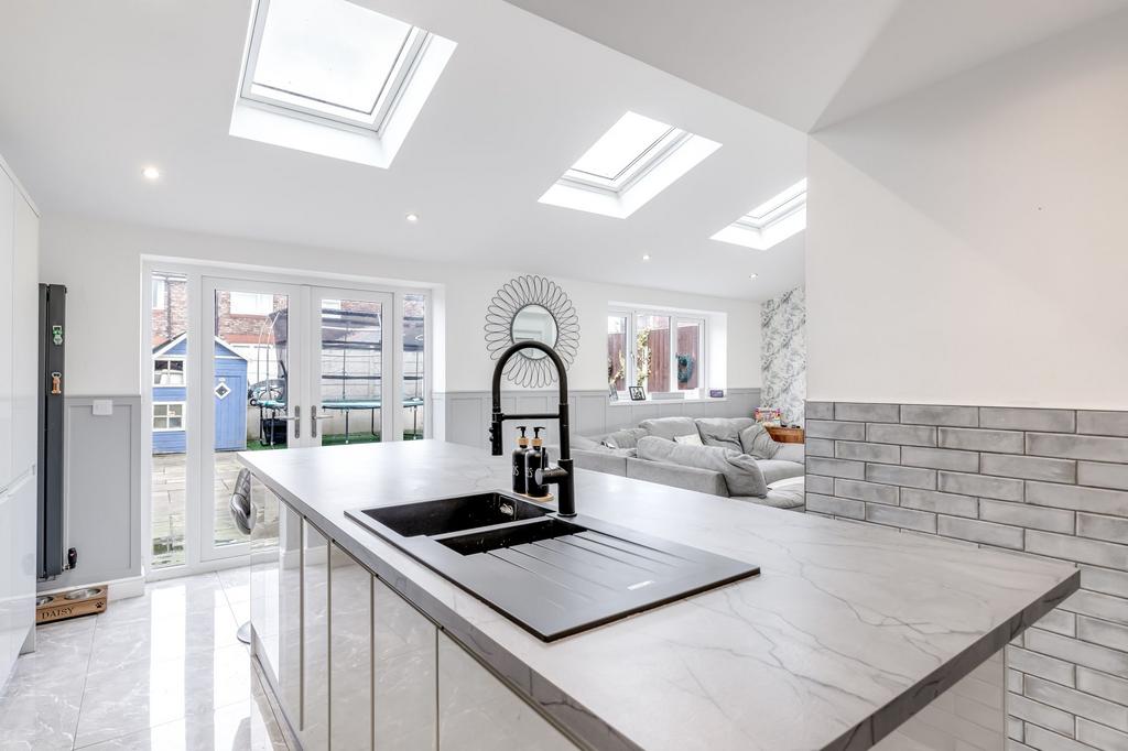 Open plan kitchen diner with seating area