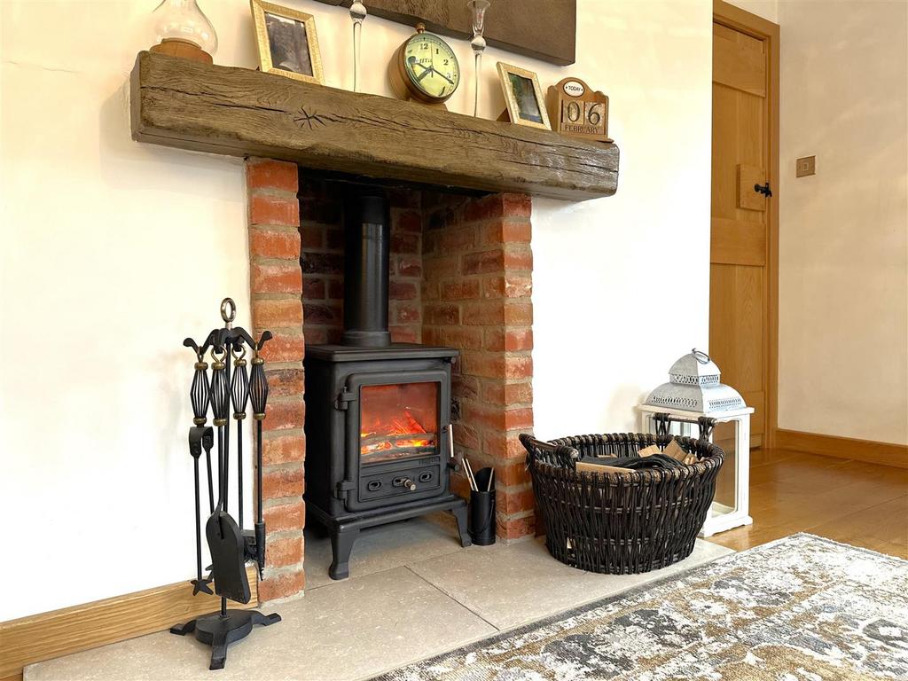 Feature Fireplace With Inset Log Burner 565