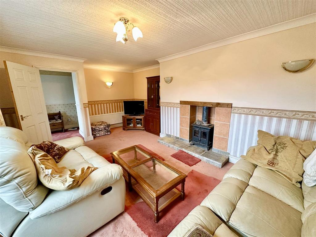 Lounge with wood burning stove.jpg