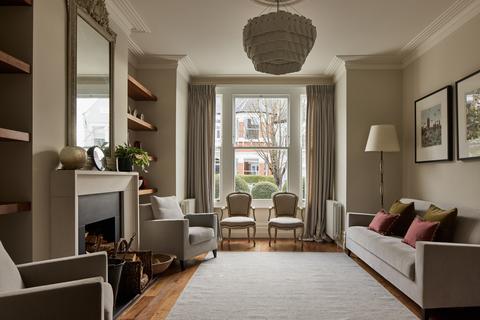 34 Bernard Gardens, London, SW19 7BE