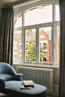 34 Bernard Gardens, London, SW19 7BE