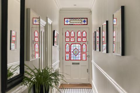 34 Bernard Gardens, London, SW19 7BE