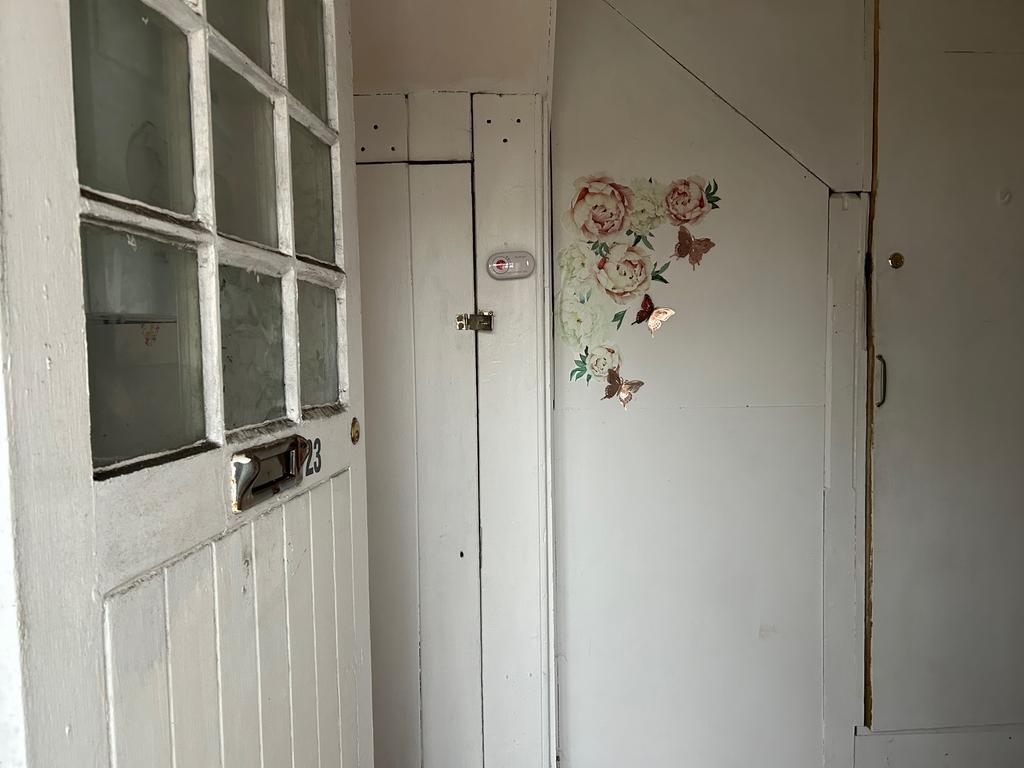 Communal entrance &amp; under stair cupboard
