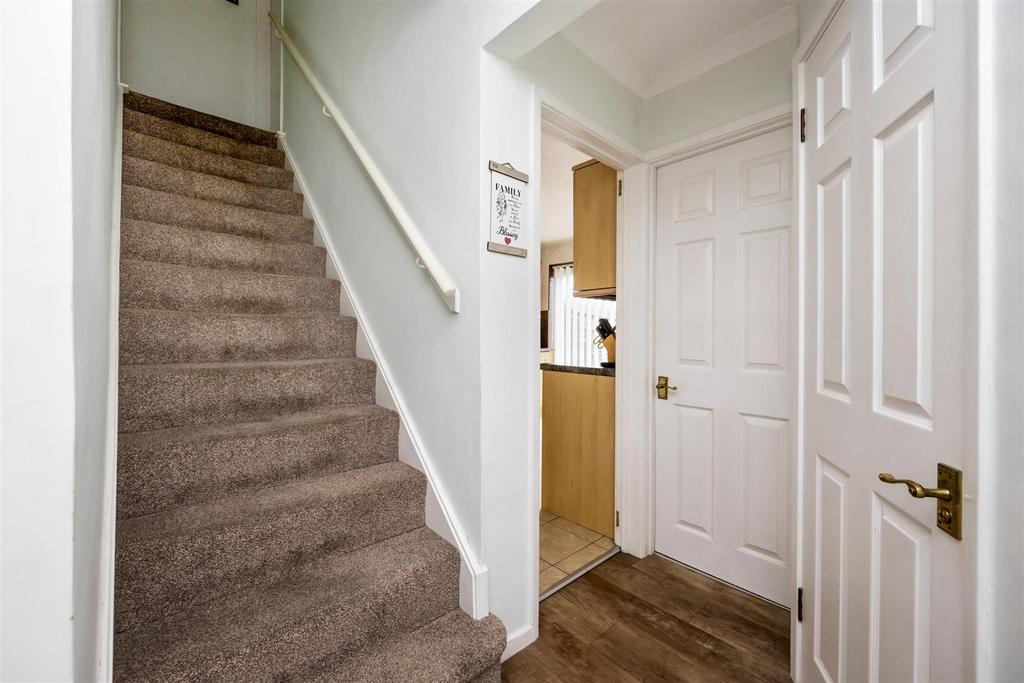 Stairs rising to First Floor