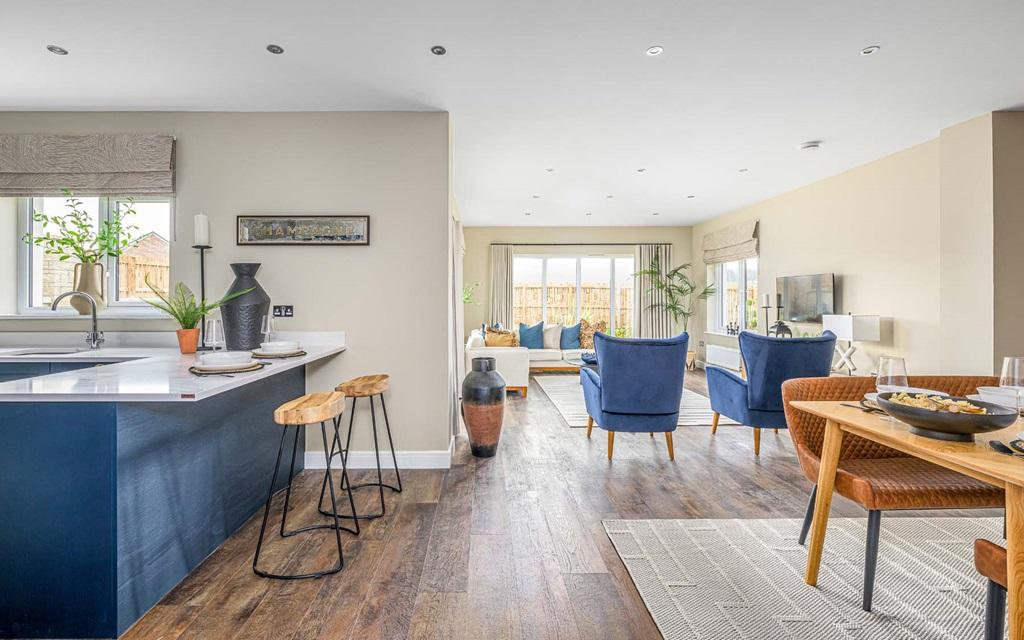 The open plan kitchen diner with garden room is...