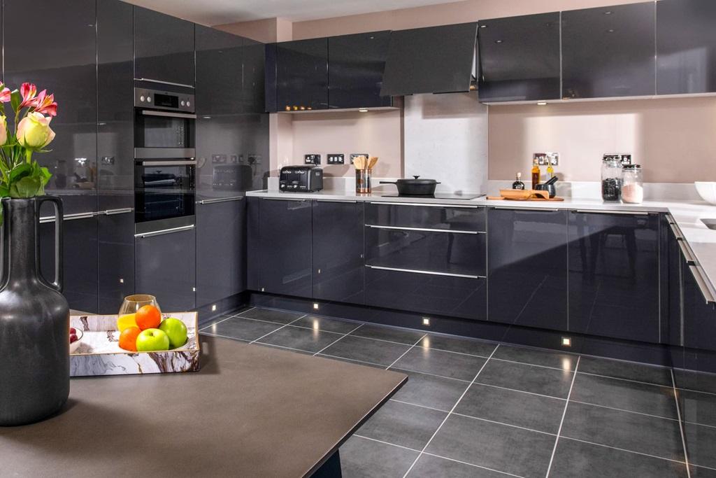 The large kitchen runs along the rear of the home
