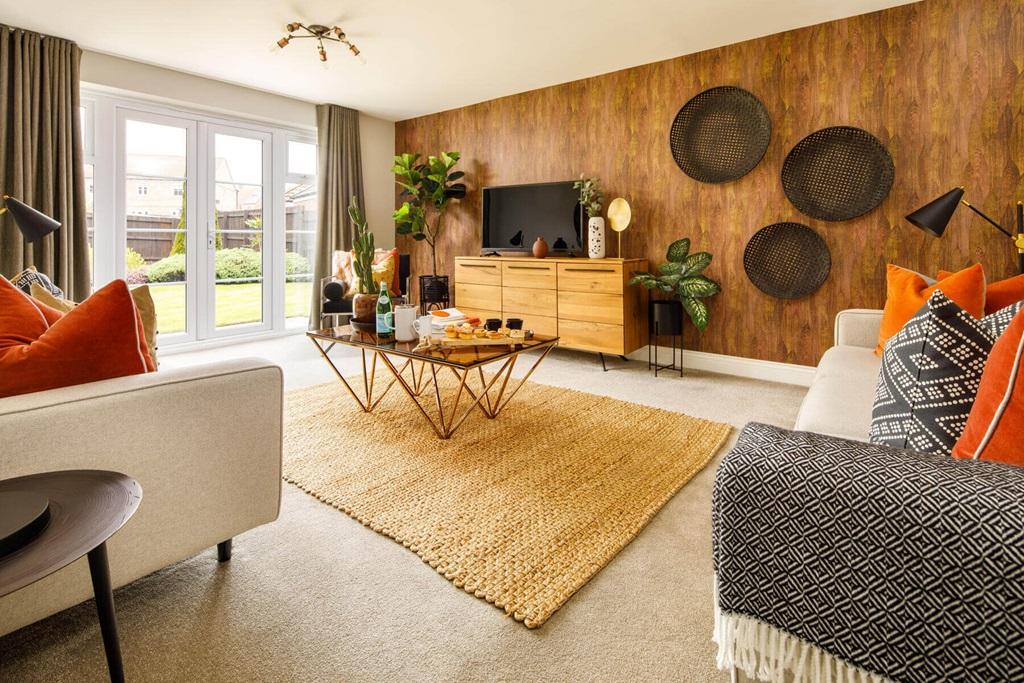 Spacious living room which also features French...