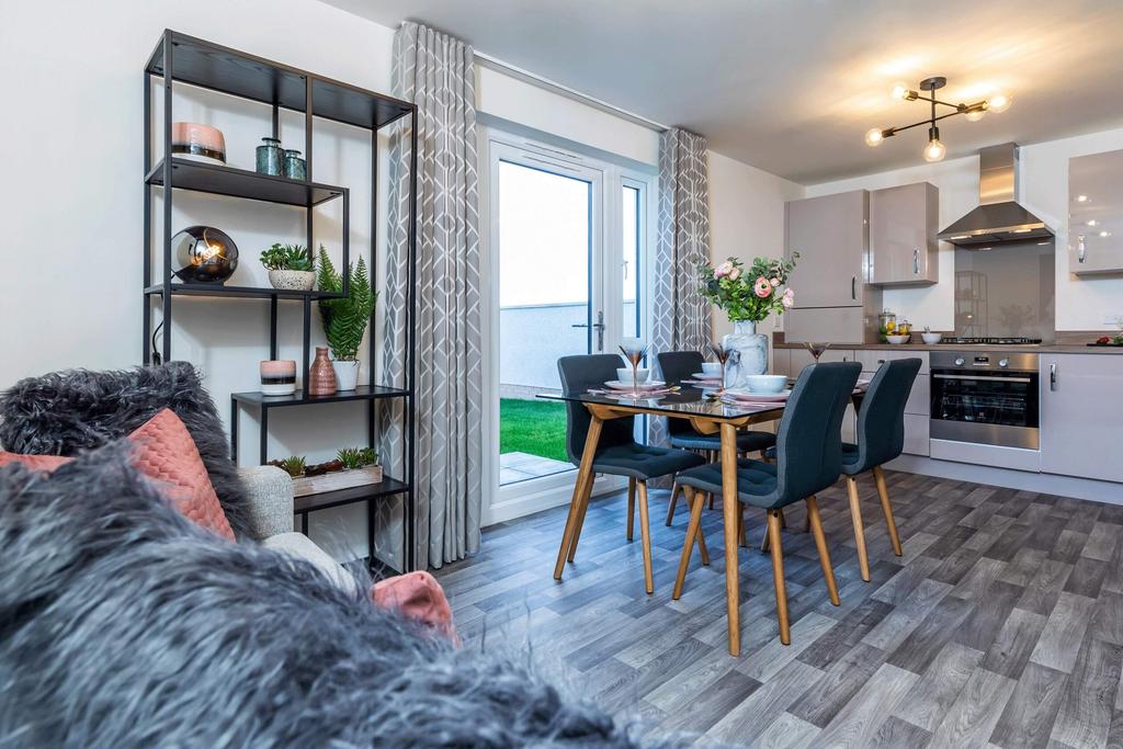 Kitchen/dining room with family area leading to...