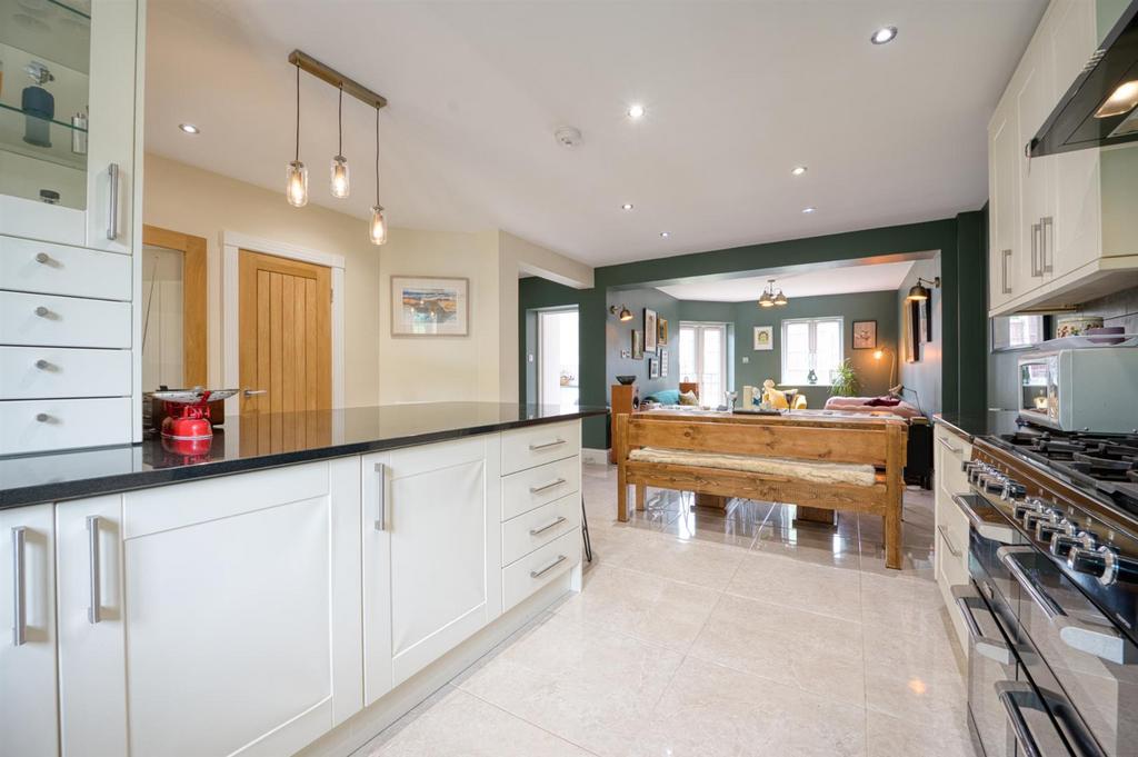 Kitchen towards dining area and lounge.jpg