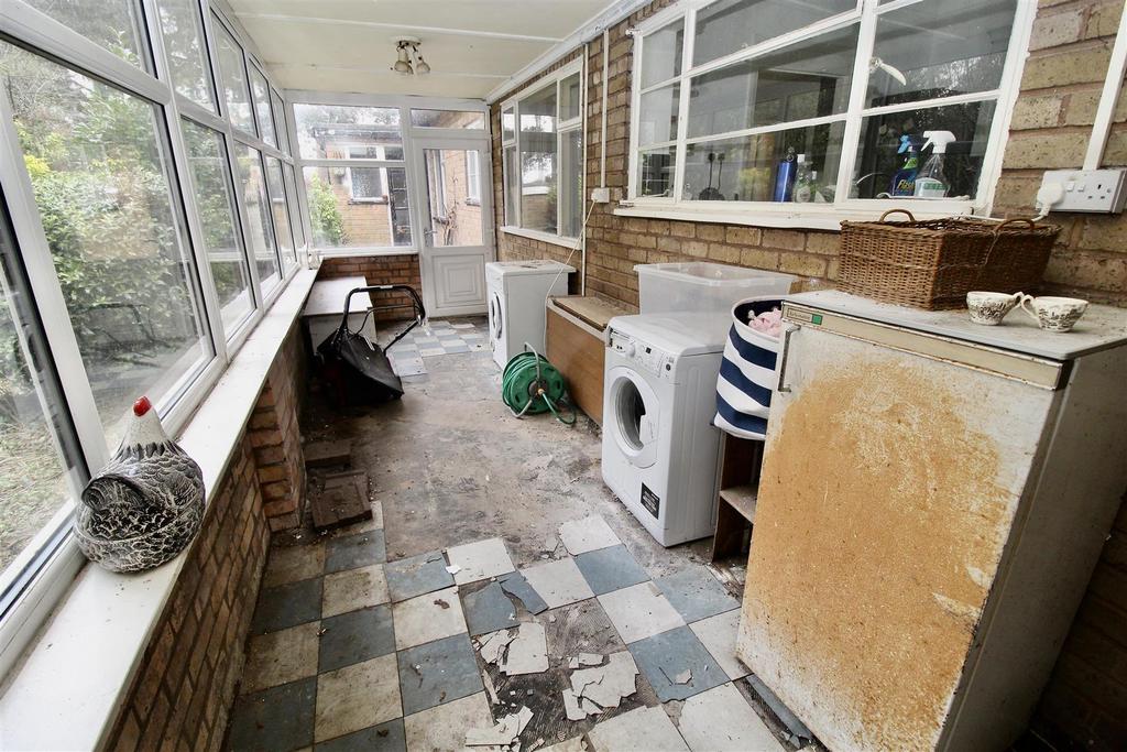Entrance Area/Utility/Sun Room