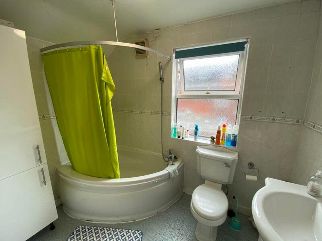 A bright and functional bathroom with a unique ...