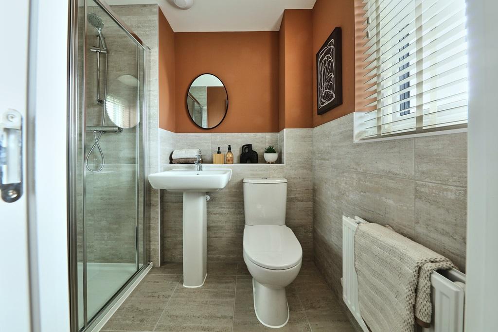 The main bedroom benefits from an en suite...