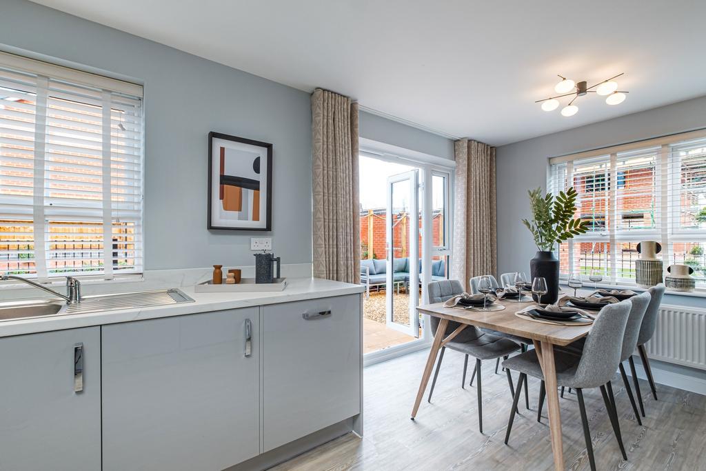 Interior view of the kitchen &amp; dining space in...