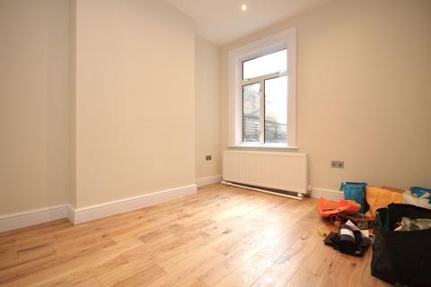 4 bedroom terraced house to rent, Berrymead Gardens, London W3 8AB