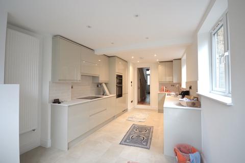 4 bedroom terraced house to rent, Berrymead Gardens, London W3 8AB