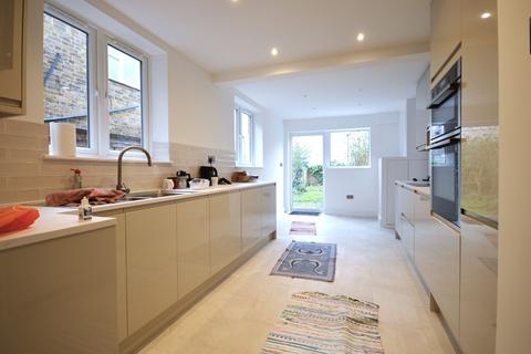 4 bedroom terraced house to rent, Berrymead Gardens, London W3 8AB