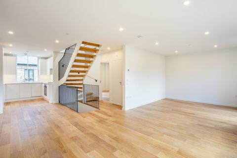 15 Russell Gardens Mews, London, W14 8EU