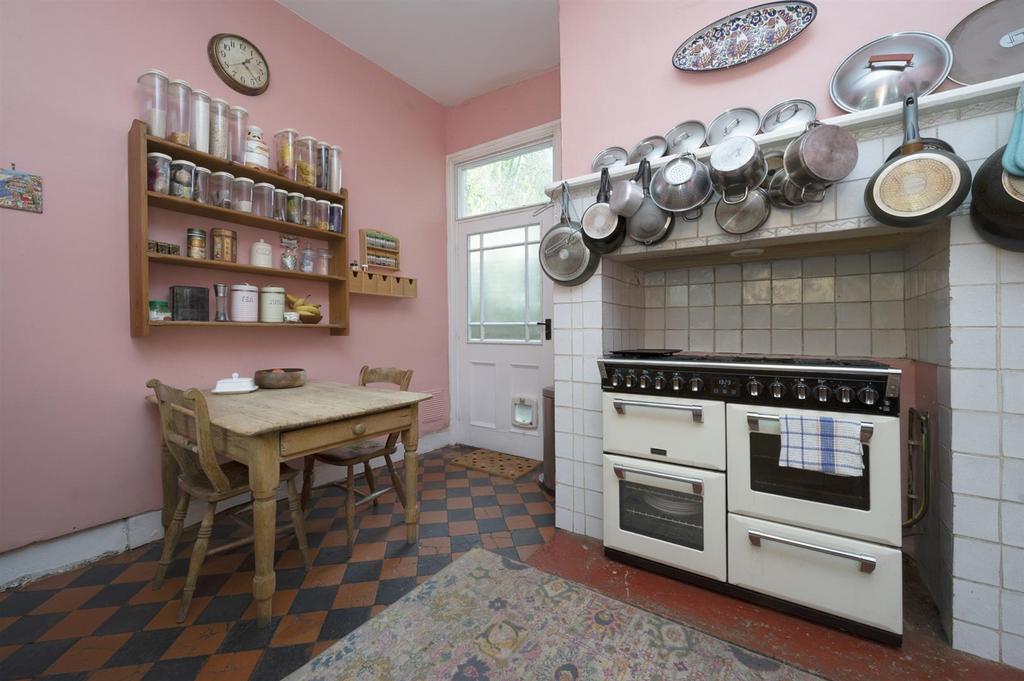 Kitchen - breakfast table and door to rear garden.