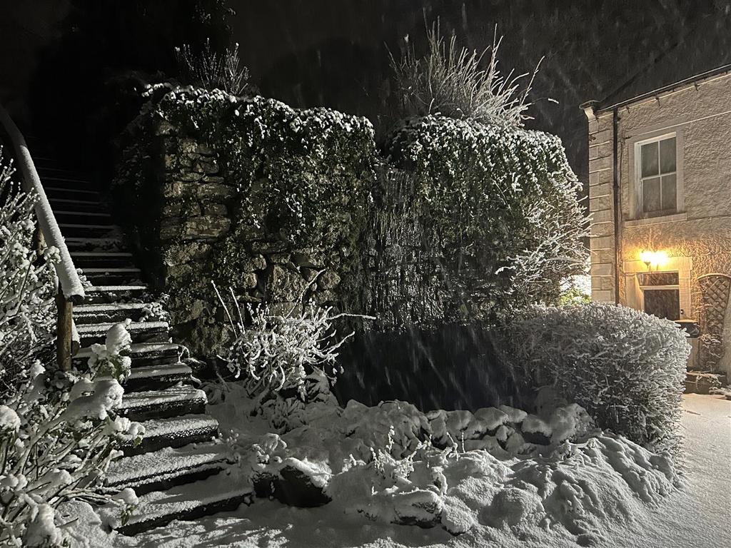 Steps beside waterfall in the snow.jpg