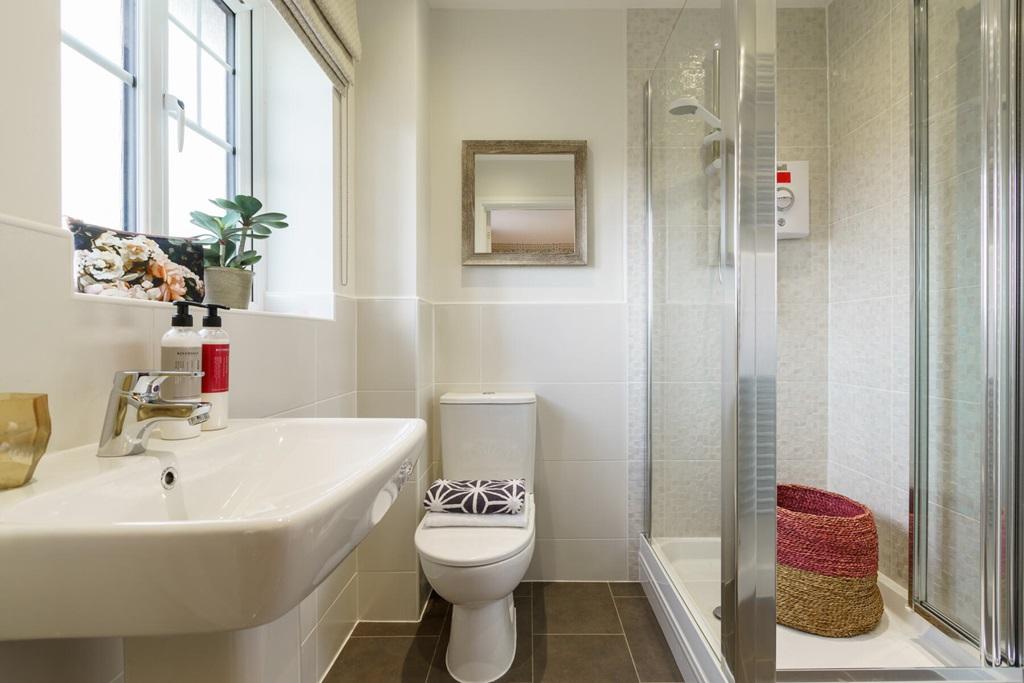 A spacious bedroom with a convenient en suite...