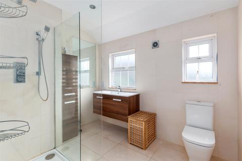 6 Stanton Road, London, SW20 8RL