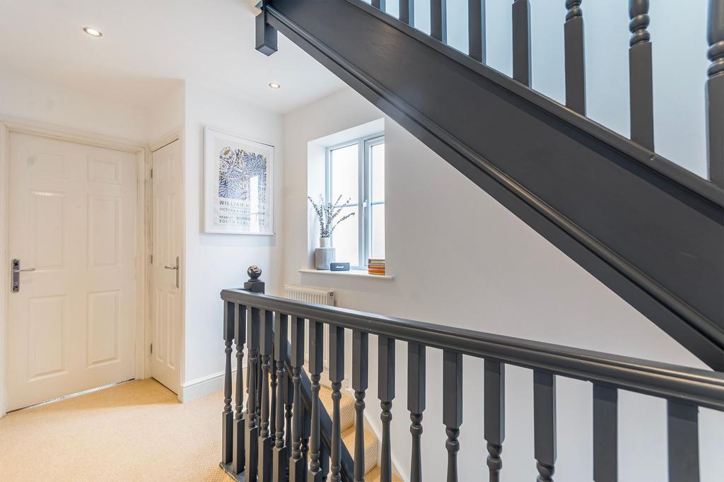 Stairs ascending to 2nd floor