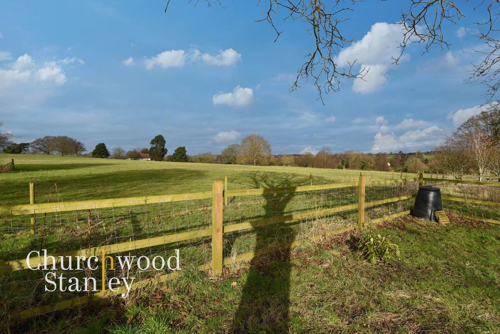 Undulating countryside beyond